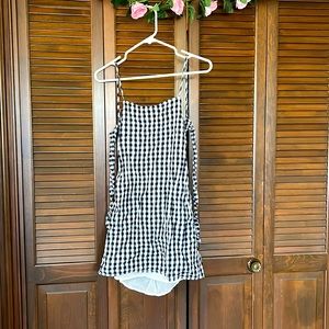 Black and white dress, tied back, with sheer under layer. Lightly used.
